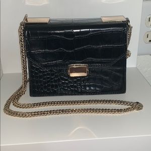 Small black and gold crossbody
